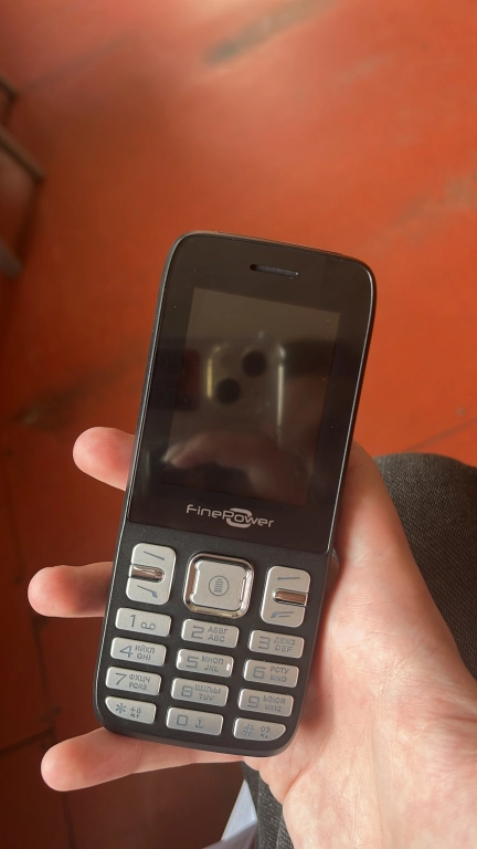 Кнопочный телефон