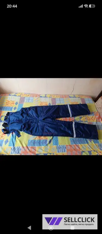 Новый, теплый комбинезон.