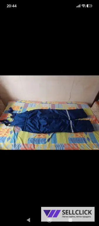 Новый, теплый комбинезон.