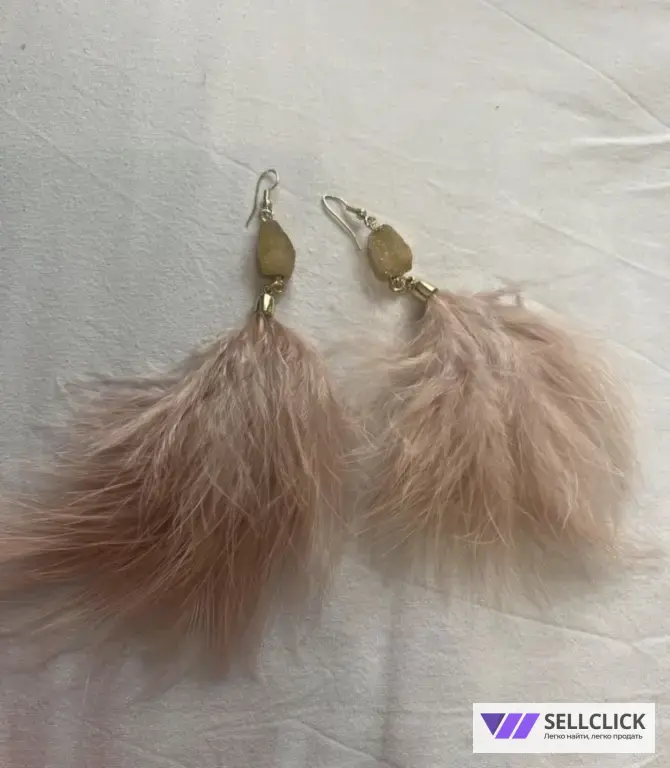 серьги с перьями