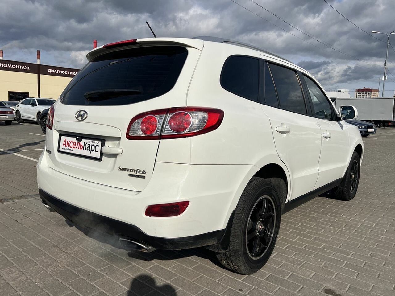 Hyundai Santa Fe, II Рестайлинг Elegance + Navi Внедорожник 5 дв. 2010 Белый 2.4 AT (174 л.с.) 4WD 335410 км