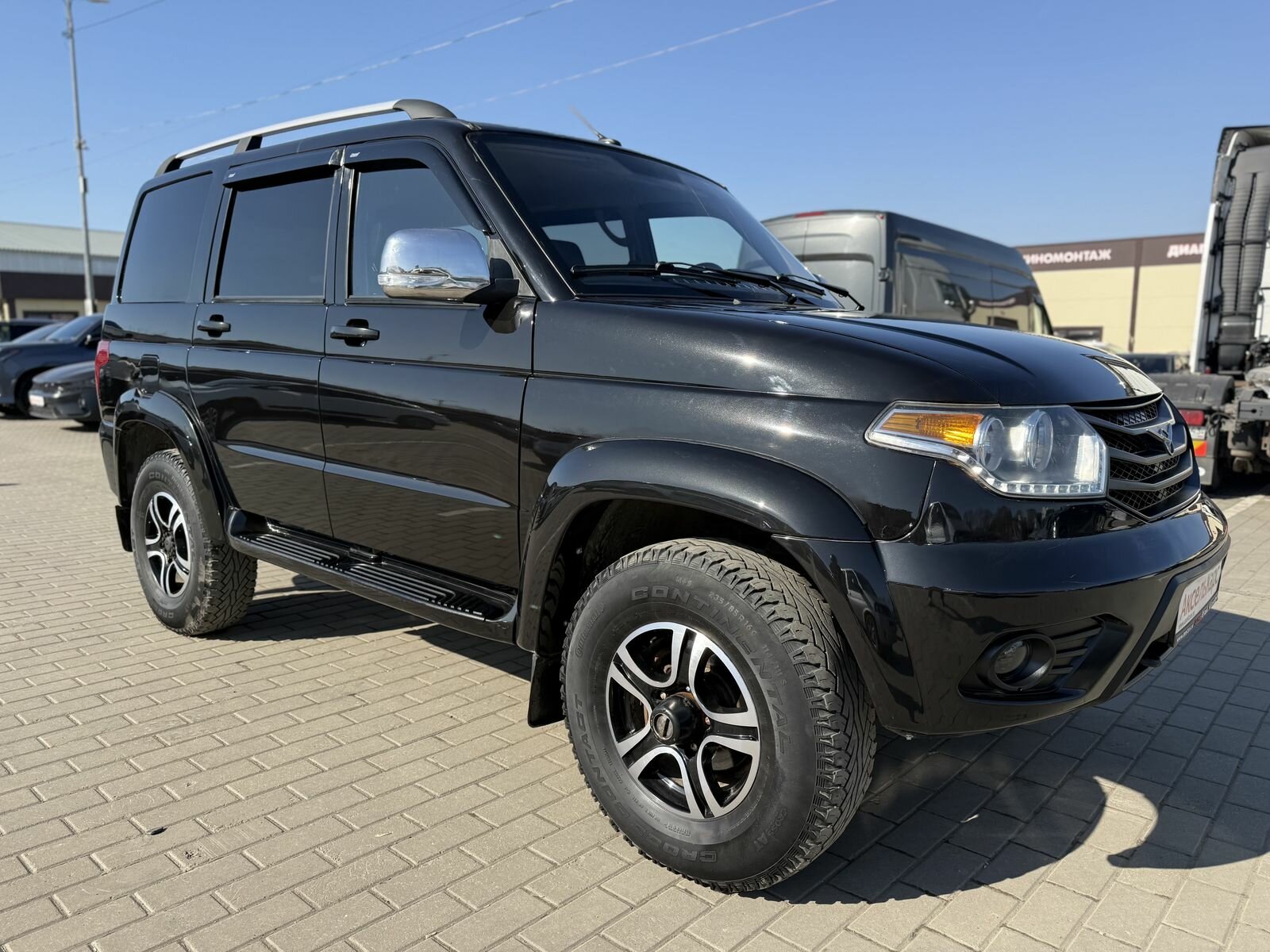 УАЗ Патриот, I Рестайлинг 2  Внедорожник 5 дв. 2015 Черный 2.7 MT (128 л.с.) 4WD 117001 км