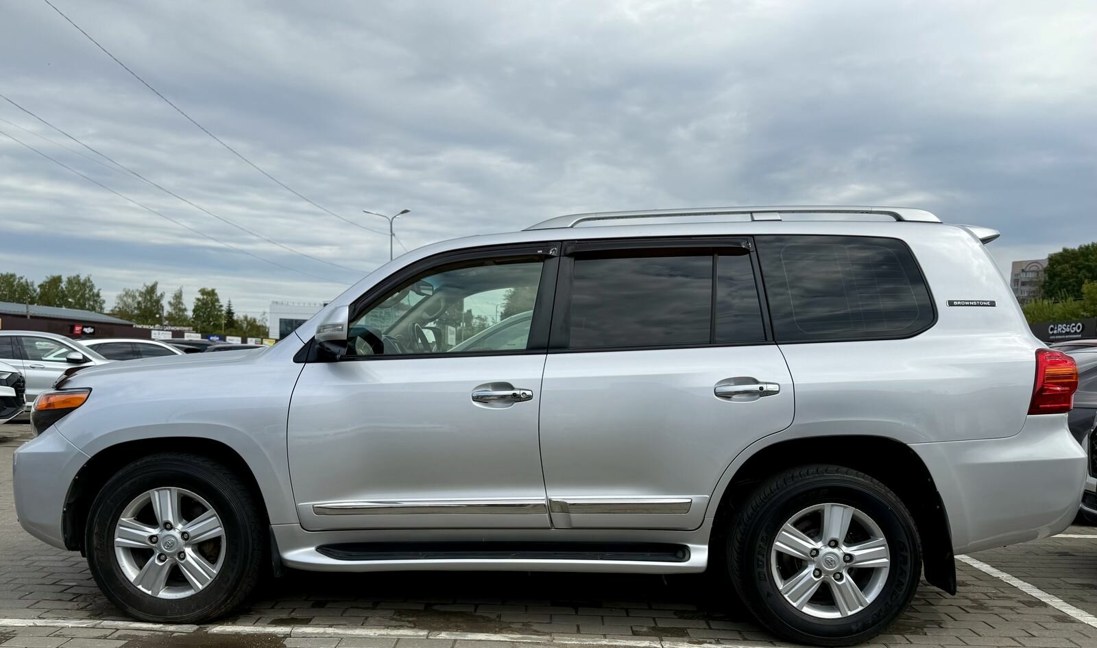 Toyota Land Cruiser, 200 Series Рестайлинг 1 SE «Brownstone» (7 мест) Внедорожник 5 дв. 2014 Серый 4.5d AT (235 л.с.) 4WD 317001 км