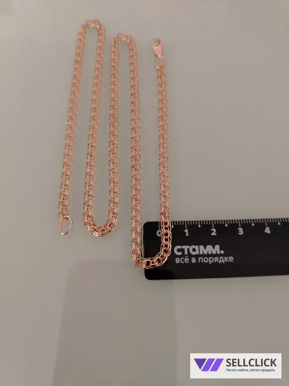 Золотая цепочка Вес 12.66 длина 53см