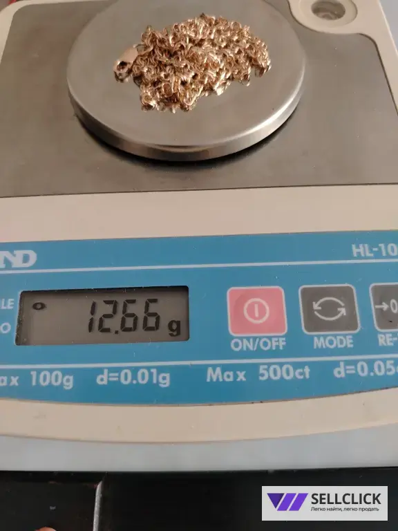 Золотая цепочка Вес 12.66 длина 53см