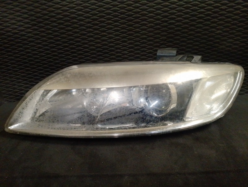 Фара передняя левая ксенон на Audi Q7 4L Дорестайлинг 2005-2009г.\nОригинал. \nВ рабочем состоянии.\nПод полировку!\nКонтрактная запчасть из Японии.\nБез пробега по РФ.\nОтправим в регионы ТК.