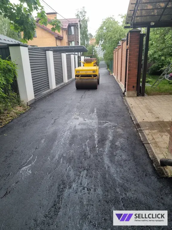 Укладка асфальта и асфальтовой крошки