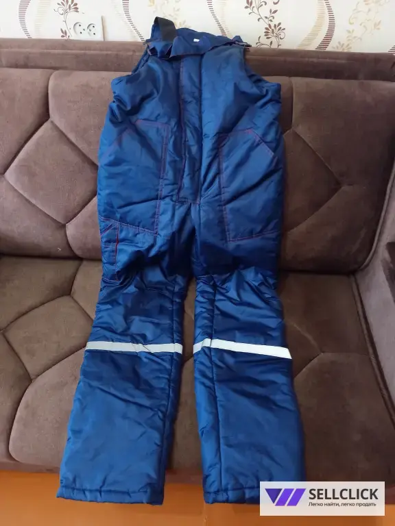 Новый, теплый комбинезон.