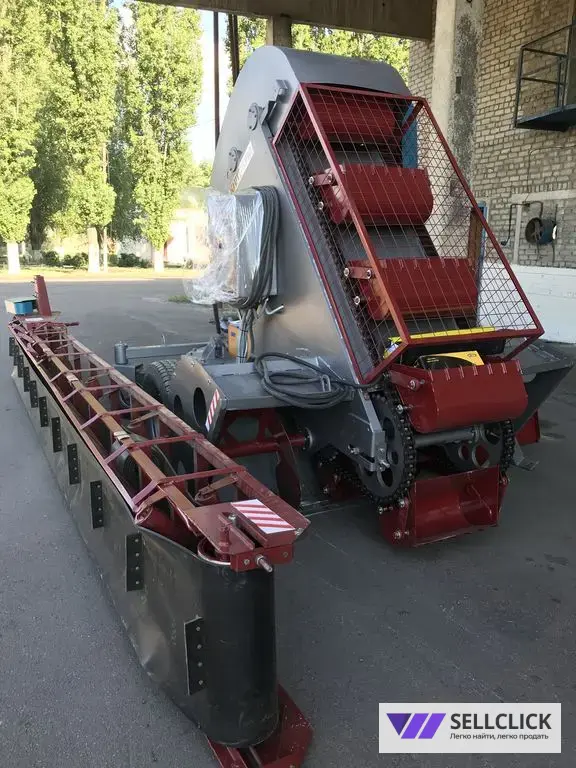 Ковшовый шнековый погрузчик КШП-6УМ-02