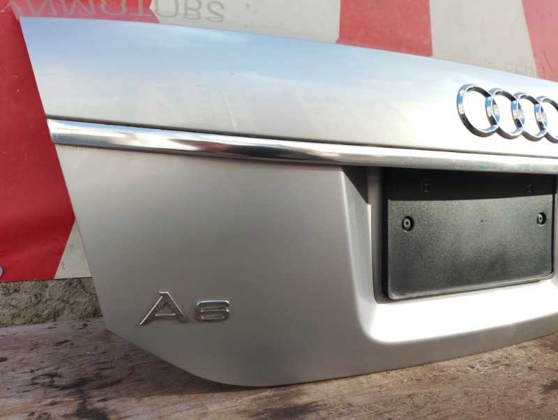 Крышка багажника на Audi A6 C6 4F / Ауди А6 С6 4Ф 2006-2012г.\nОригинал. Заводская краска, цвет кузова серебро, код краски 5B.\nВ отличном состоянии. Без дефектов.\nКонтрактная запчасть из Японии. \nГарантия на установку и проверку.\nОтправим в регионы ТК