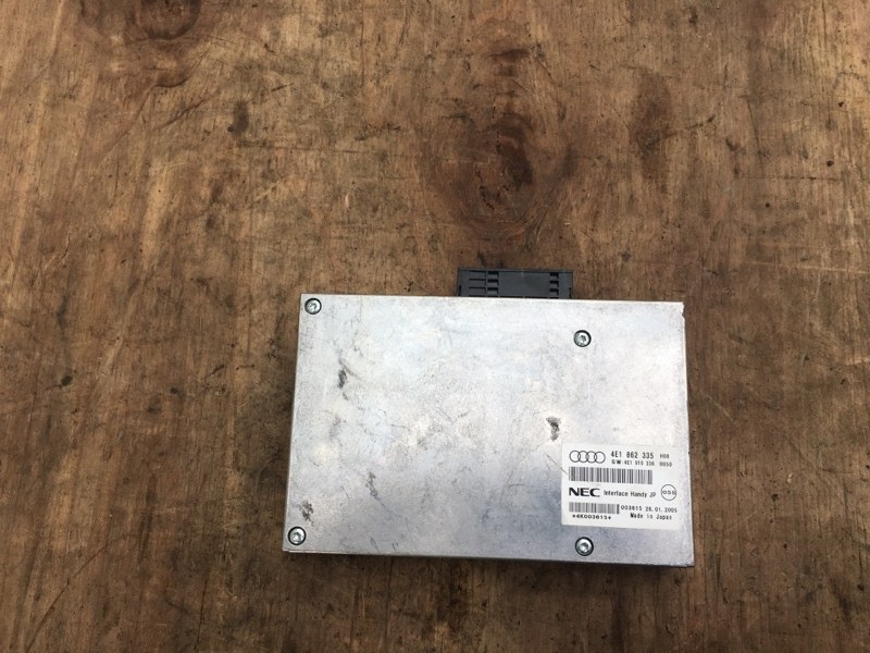 Блок управления телефоном MMI NEC на Audi A6 C6 4F / Ауди А6 С6 2006-2012г.\nОригинал.\nРабочий, проверен.\nКонтрактная запчасть из Японии. Гарантия на все запчасти. Отправим в регионы ТК.