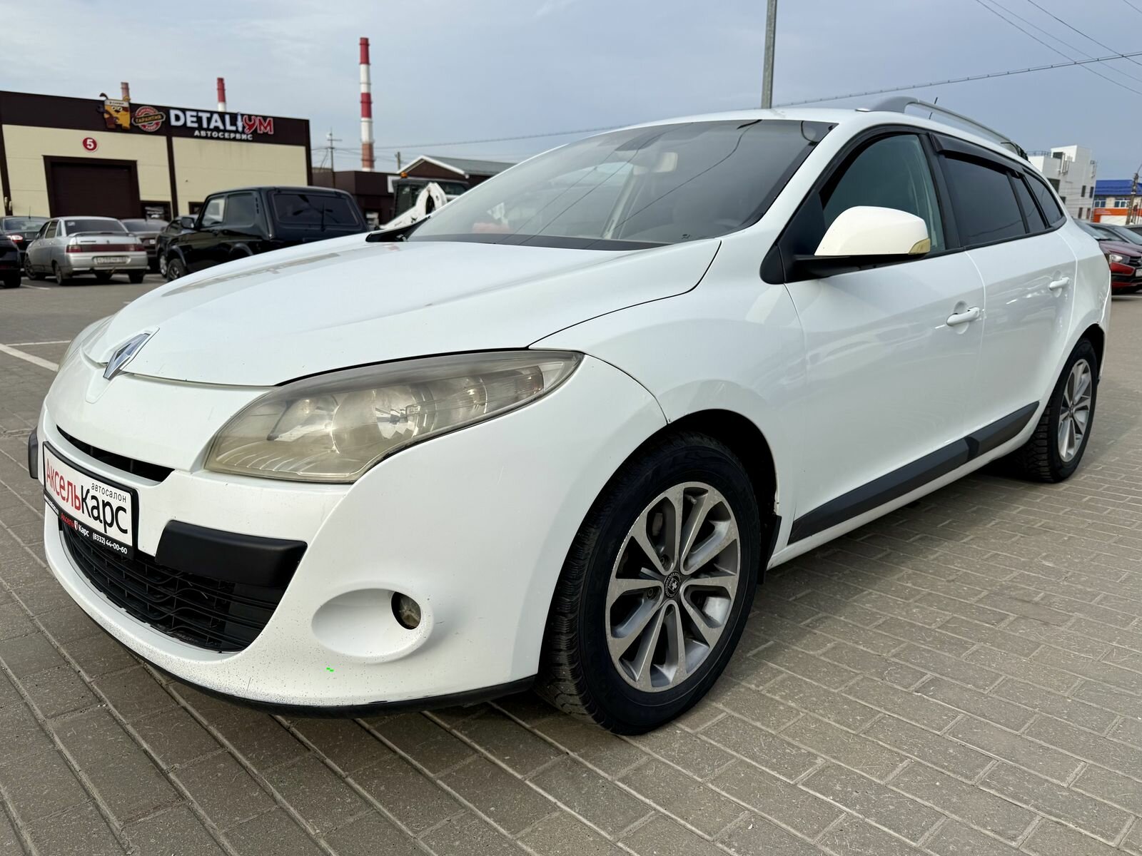 Renault Megane, III  Универсал 5 дв. 2009 Белый 1.5d MT (85 л.с.) 272001 км