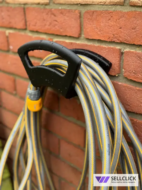 Держатель для поливочного шланга