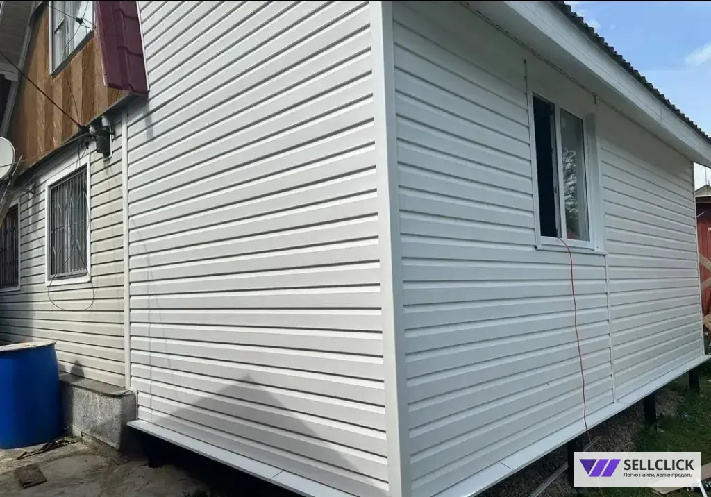 Фасад. Фасадные работы. Отделка сайдингом